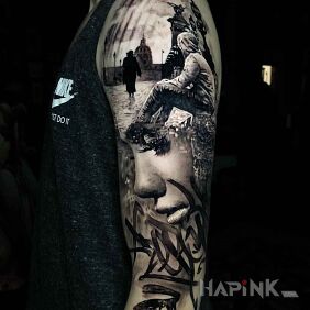Tattoo Sitting on the wall on the upper arm motif: faces style: graffiti