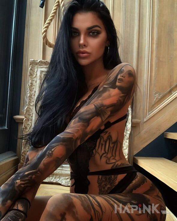 Tattoo Czarna jak kawa in faces motif and realistic style on the leg