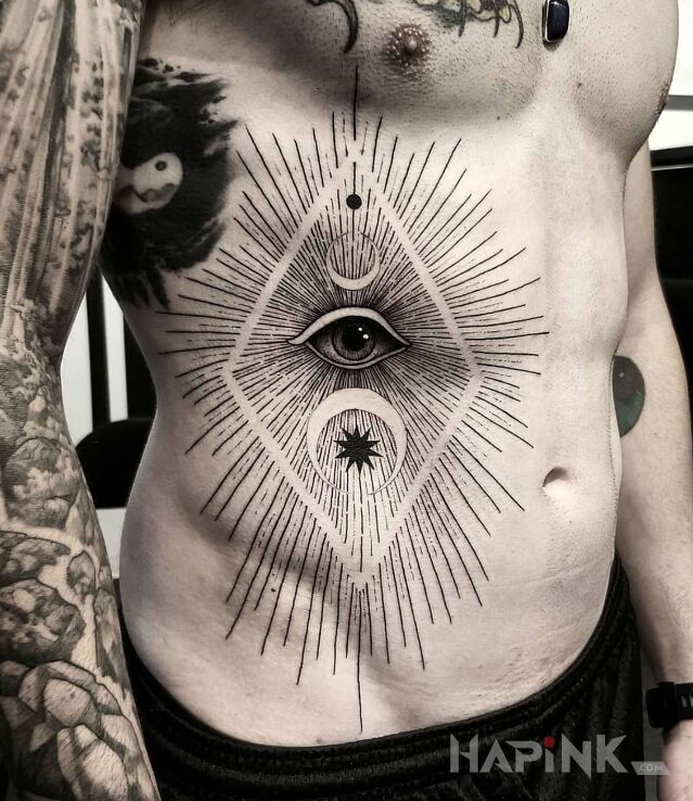 Tattoo Promieniste oko in black and gray motif and graphic / illustrative style on the stomach