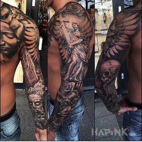 Tattoo Angel with a cross in his hands on the upper arm motif: flowers style: realistic
