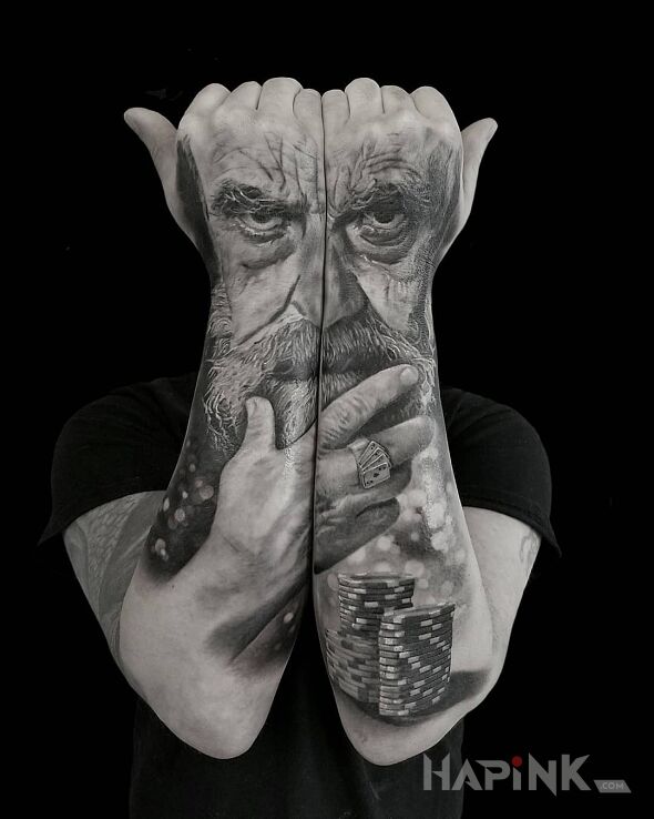 Tattoo Wąsacz in faces motif and realistic style on the forearm