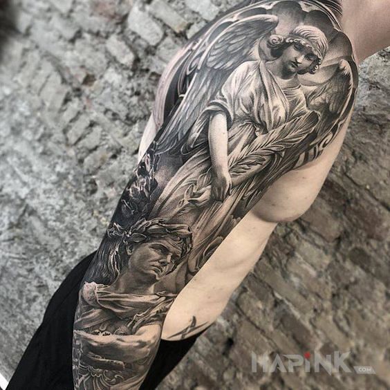 Tattoo Aniol nad cesarzem in black and gray motif and realistic style on the upper arm