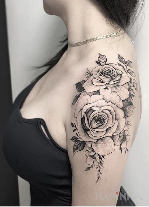 Tattoo Dwie róże na ramienu in black and gray motif and realistic style on the upper arm
