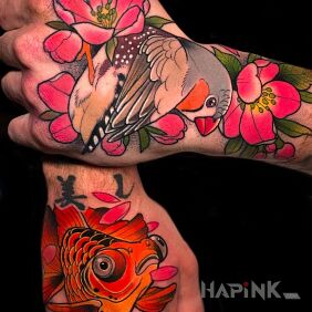 Tattoo Carp on the hand motif: colorful style: japanese / irezumi