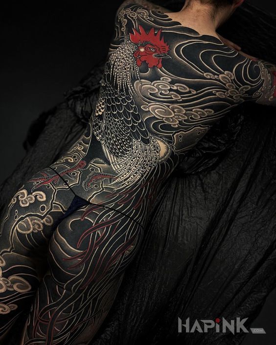 Tattoo Czarne irezumi in animals motif and blackwork / blackout style on the leg