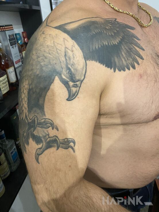Tattoo Orzeł in animals motif and realistic style on the upper arm