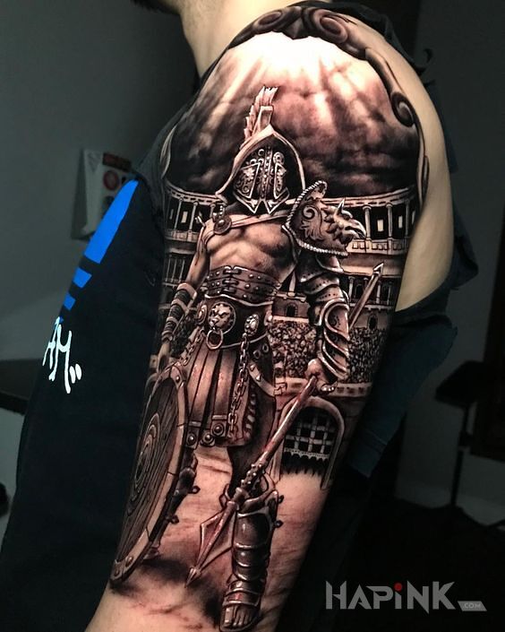 Tattoo Gladiator in black and gray motif and realistic style on the upper arm