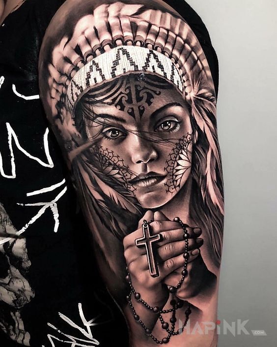Tattoo Indianka z różańcem in religious motif and realistic style on the upper arm