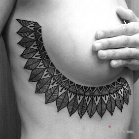 Tattoo Leaves at the breast on the breast motif: other style: graphic / illustrative