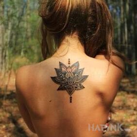 Tattoo Flower on the back on the back motif: flowers