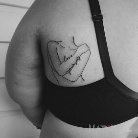 Tattoo Body positive tatoo on the shoulder blades motif: black and gray style: contour / linework