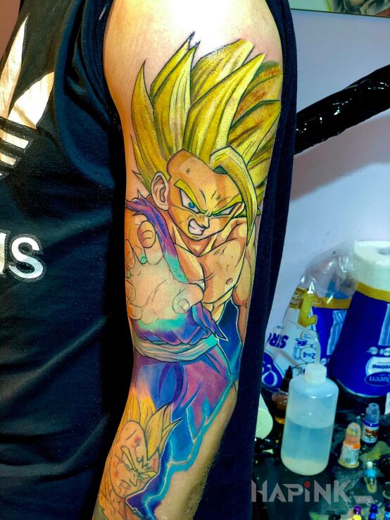 Tattoo Dragon Ball Son Gohan SSJ2 (One-hand Kamehameha) in characters motif and cartoon / comic book style on the forearm