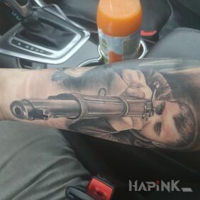 Tattoo Rifleman, rifle on the forearm motif: black and gray style: realistic