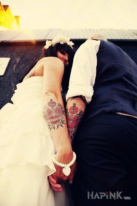 Tattoo Nowożeńcy z tatuażami in Love motif on the forearm