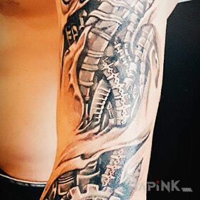 Tattoo First ? on the forearm motif: black and gray style: biomechanics