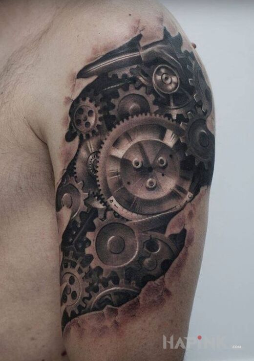 Tattoo Wiele kół zębatych in ripped skin motif and realistic style on the upper arm