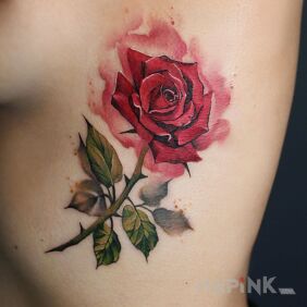 Tattoo Burning rose on the ribs motif: colorful style: realistic