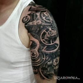 Tatuaż Mechanizm na ramieniu motyw: czarno-szare styl: realistyczne