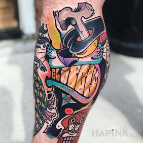 Tattoo Annoyed pet on the calf motif: lettering style: graffiti