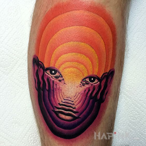 Tattoo Dziwna sprawa in colorful motif and surrealistic style on the calf