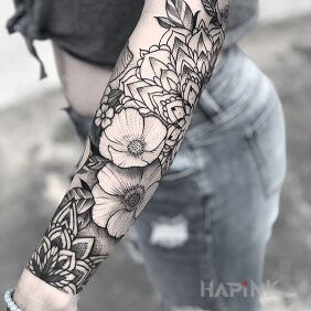 Tattoo Flowers + mandala on the forearm motif: black and gray style: graphic / illustrative