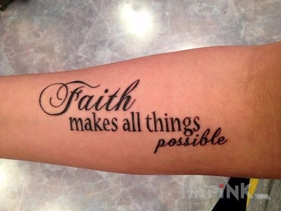 Tattoo Wiara in lettering motif and calligraphy style on the forearm
