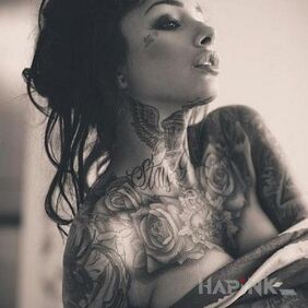 Tattoo Girl covered with holes all over her body on the neck motif: sexy