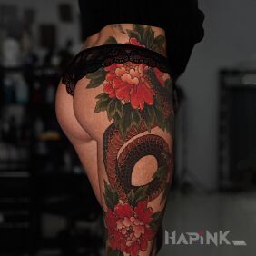 Tattoo Peonies with a snake on the leg motif: animals style: realistic