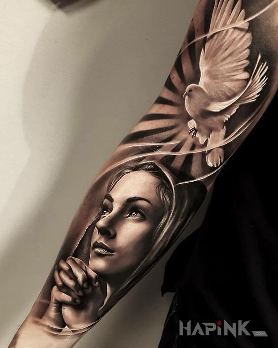 Tattoo Wyczekiwanie na Boga in sleeves motif and realistic style on the upper arm