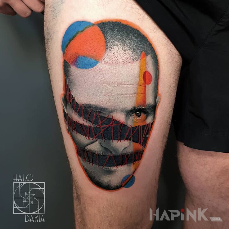 Tattoo Nieco inny portret in black and gray motif and surrealistic style on the leg