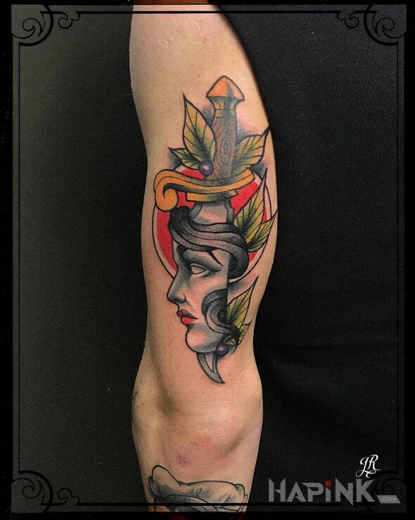 Tattoo Profil kobiety in colorful motif and neo-traditional style on the upper arm