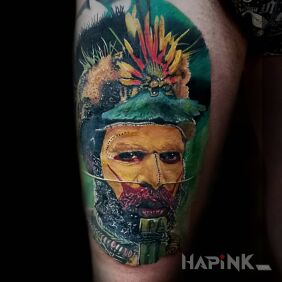 Tattoo Portrait of a man on the leg motif: faces style: realistic