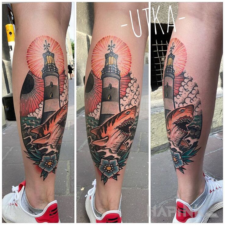 Tattoo Latarnia morska in flowers motif and neo-traditional style on the calf
