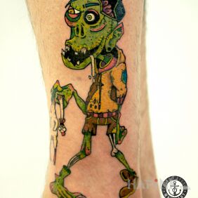 Tattoo Zombie on the leg motif: characters style: cartoon / comic book