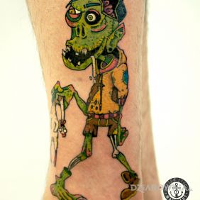 Tatuaż Zombie na nodze motyw: postacie styl: kreskówkowe / komiksowe