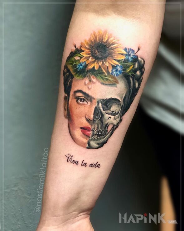 Tattoo Frida in faces motif and realistic style on the forearm
