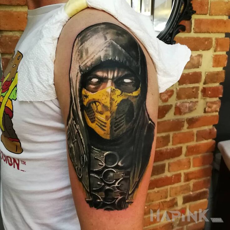 Tattoo Skorpion in colorful motif and realistic style on the upper arm