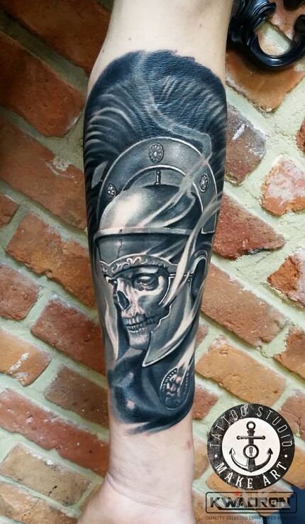 Tattoo Rzymianin in black and gray motif and realistic style on the forearm
