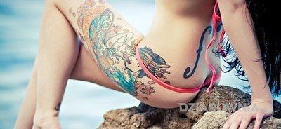 Tatuaż gejsza na udzie w motywie seksowne i stylu japońskie / irezumi na plecach
