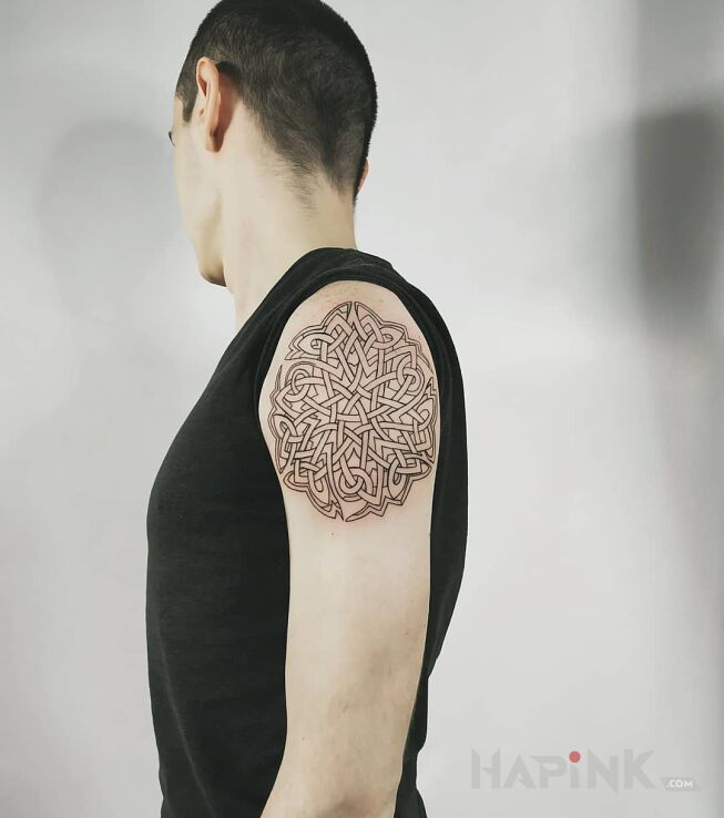 Tattoo Ornament in mandalas motif and contour / linework style on the upper arm