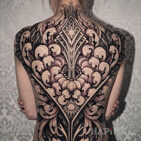 Tattoo A truly huge chrysanthemum on the shoulder blades motif: black and gray style: graphic / illustrative