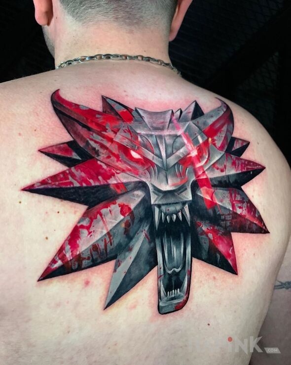 Tattoo Wiedźmin in other motif and realistic style on the back