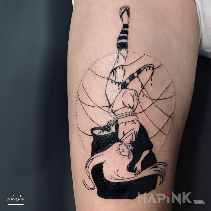 Tattoo Nezuko in black and gray motif and graphic / illustrative style on the leg