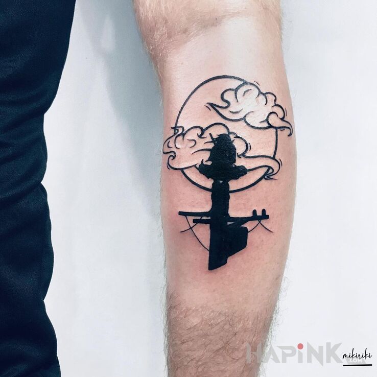Tattoo Itachi in black and gray motif and graphic / illustrative style on the calf