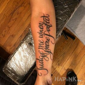 Tattoo Judging other people on the forearm motif: lettering style: calligraphy