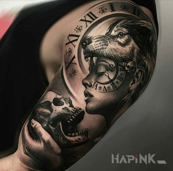Tattoo Kobieta w wilczym kapturze in black and gray motif and realistic style on the upper arm