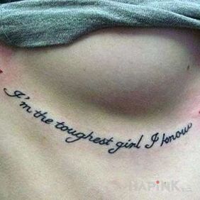 Tattoo Tough grandmother on the ribs motif: lettering style: calligraphy