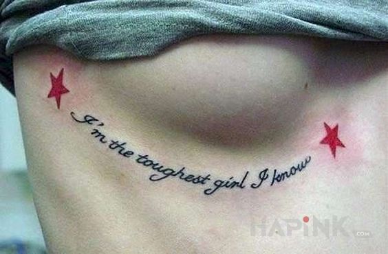Tattoo Twarda babka in lettering motif and calligraphy style on the ribs