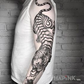 Tattoo Big tiger on the forearm motif: animals style: graphic / illustrative