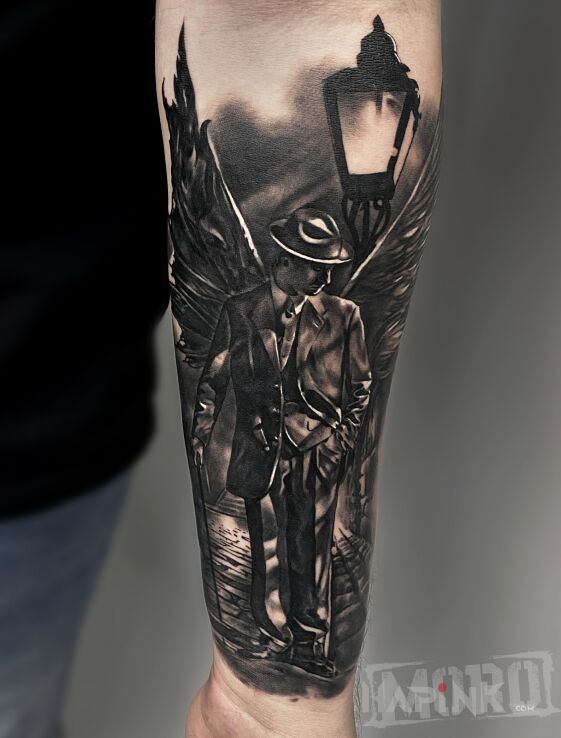 Tattoo Angel or Demon? in angels motif and realistic style on the forearm